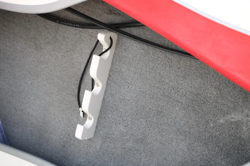 Slide: The Image of Interior of 2010 Tahoe Q7i boat showing cable management on carpeted surface. - 39