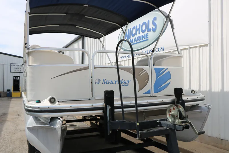 Slide: The Image of 2008 Sun Cruiser SS200 pontoon boat on trailer at Nichols Marine dealership. - 8