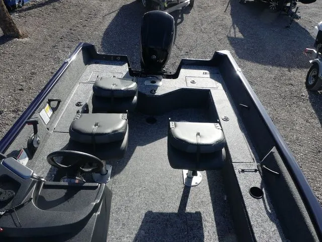 Slide: The Image of 2026 Tracker Pro Guide V-16 SC boat interior with seating. - 13