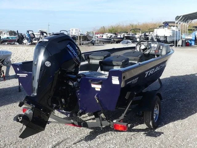 Slide: The Image of 2026 Tracker Pro Guide V-16 SC boat on a trailer. - 4