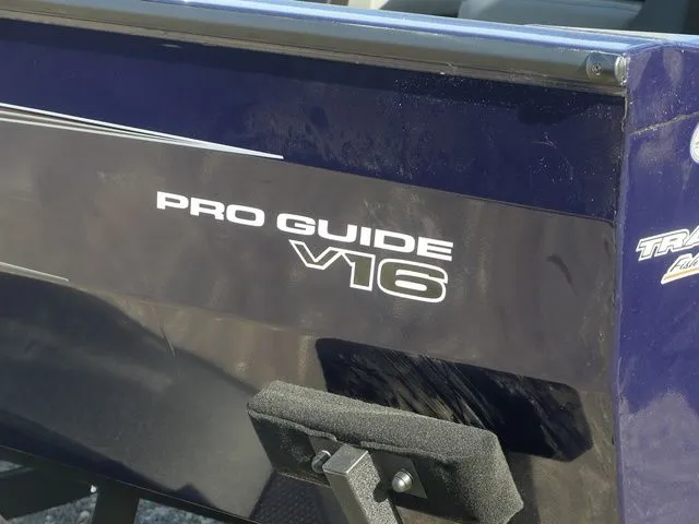 Slide: The Image of 2026 Tracker Pro Guide V-16 SC boat, close-up of logo. - 8