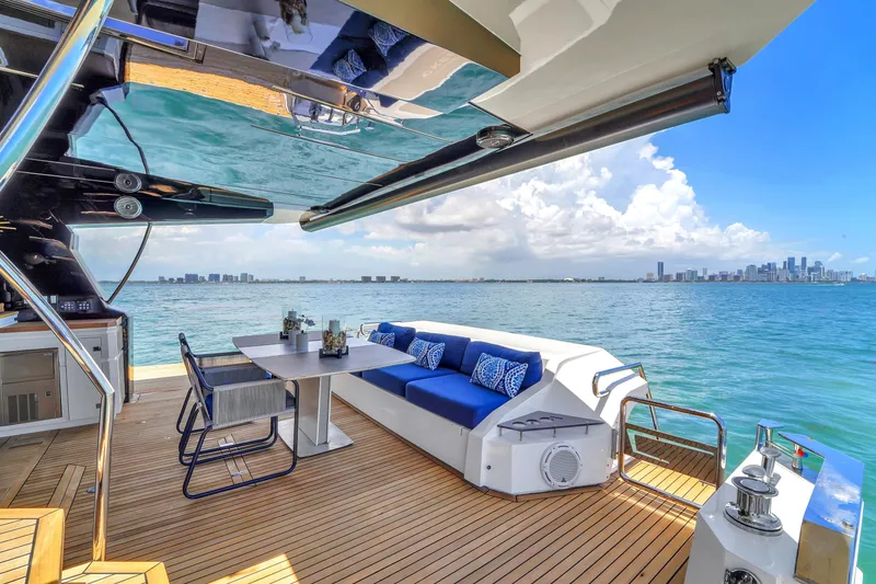 Slide: The Image of Luxurious 2021 OKEAN 80 yacht deck with ocean view and city skyline. - 14
