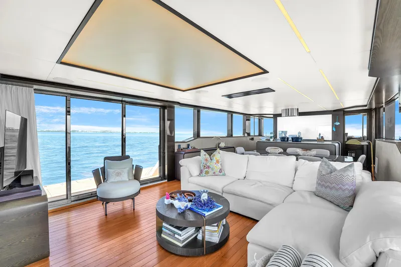 Slide: The Image of Luxurious interior of 2021 OKEAN 80 yacht with panoramic ocean views and modern furnishings. - 17