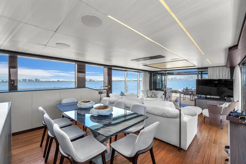 Slide: The Image of Luxurious interior of 2021 OKEAN 80 yacht with panoramic ocean views and modern furnishings. - 18