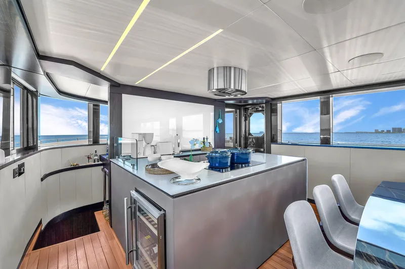Slide: The Image of Luxurious interior of 2021 OKEAN 80 yacht with modern kitchen and ocean view. - 21