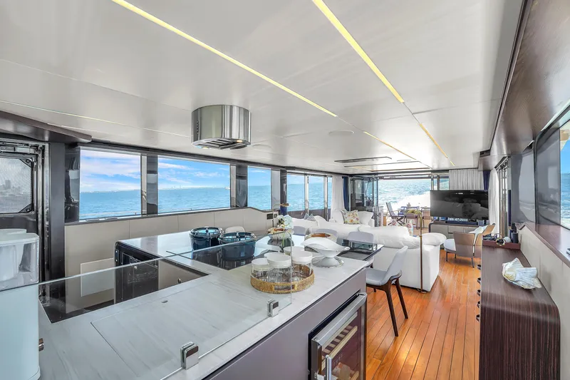 Slide: The Image of Luxurious interior of 2021 OKEAN 80 yacht with ocean view, modern furnishings, and sleek design. - 22