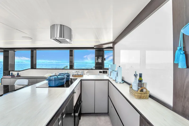 Slide: The Image of Luxurious kitchen interior on 2021 OKEAN 80 yacht with ocean view. - 23