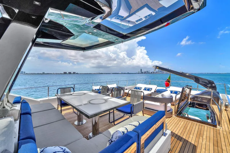 Slide: The Image of Luxurious 2021 OKEAN 80 yacht deck with modern seating and ocean view. - 28