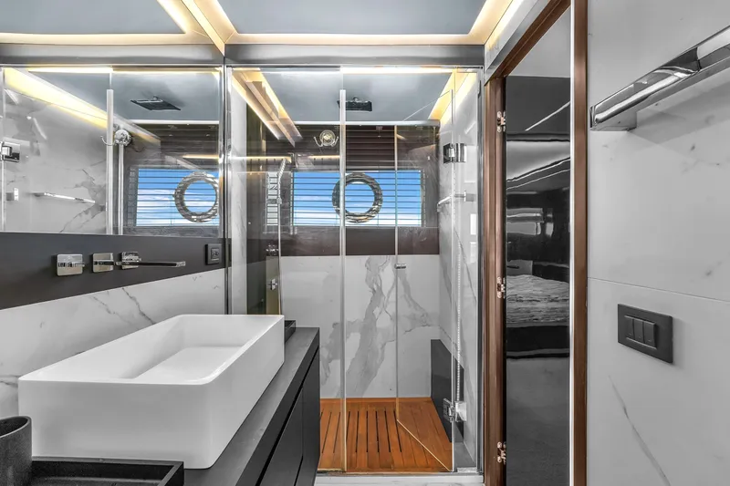 Slide: The Image of Luxurious bathroom in 2021 OKEAN 80 yacht with modern fixtures and elegant design. - 51