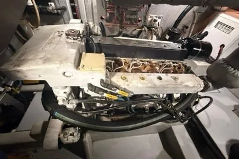 Slide: The Image of Engine room of a 2001 Nordhavn 40 yacht, showcasing its mechanical components. - 17