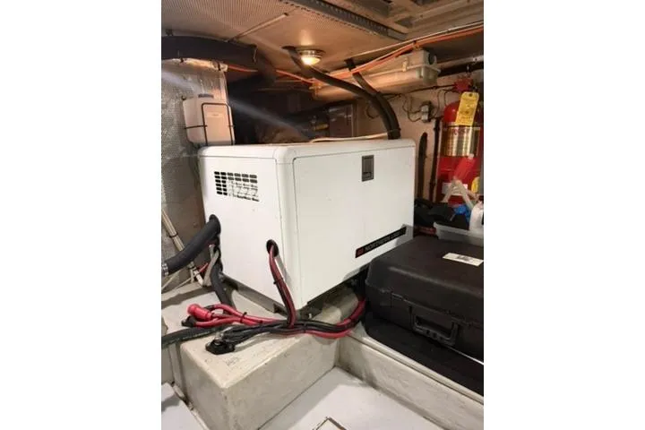 Slide: The Image of Engine room of a 2001 Nordhavn 40 yacht with equipment and wiring. - 19