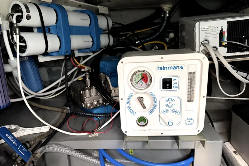 Slide: The Image of Engine room of 2001 Nordhavn 40 with Rainman watermaker system and control panel. - 22