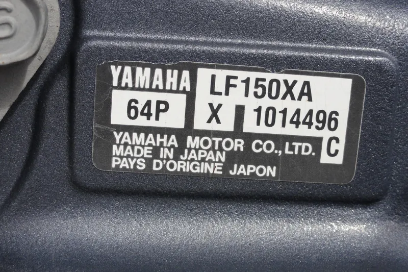 Slide: The Image of Yamaha motor label on 2012 Contender 25 Tournament, model LF150XA, made in Japan. - 10