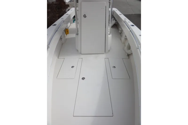 Slide: The Image of 2012 Contender 25 Tournament boat deck with storage compartments and clean layout. - 15