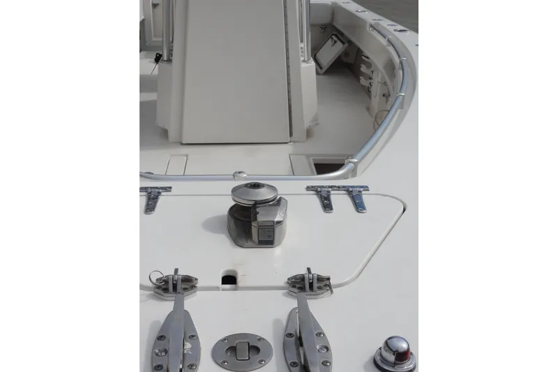 Slide: The Image of 2012 Contender 25 Tournament boat deck with winch and cleats. - 16