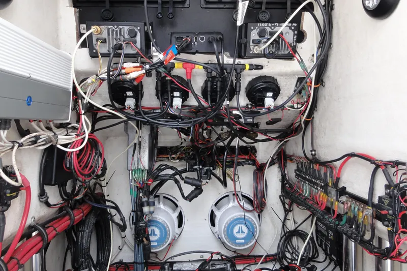 Slide: The Image of Electrical wiring and components inside a 2012 Contender 25 Tournament boat. - 18