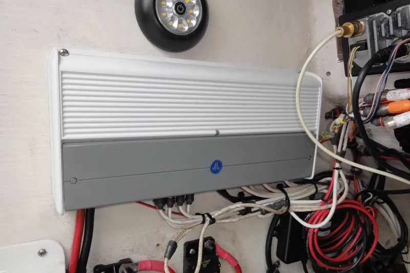 Slide: The Image of Electrical wiring and components inside a 2012 Contender 25 Tournament boat. - 20