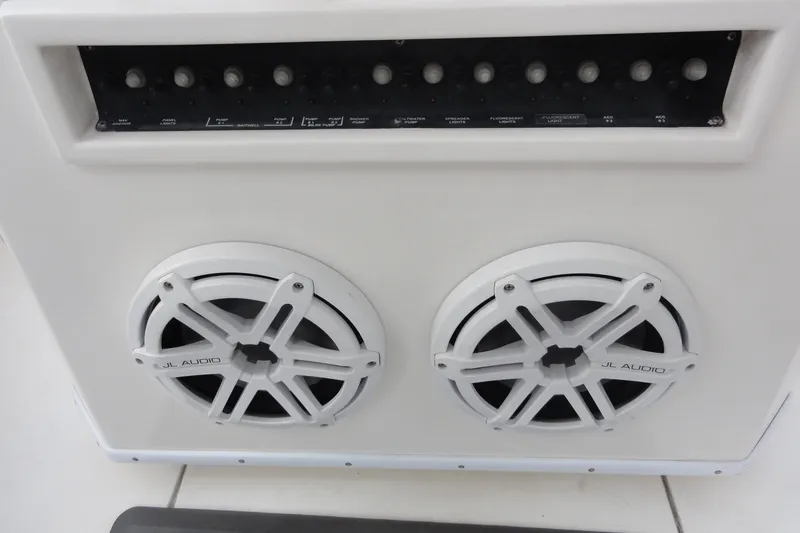 Slide: The Image of JL Audio speakers and control panel on a 2012 Contender 25 Tournament boat. - 28