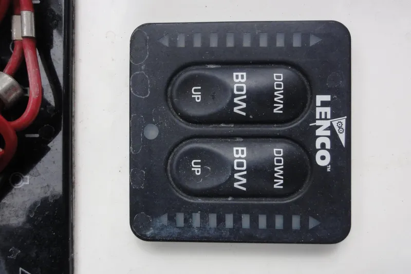 Slide: The Image of Lenco trim tab control panel on 2012 Contender 25 Tournament boat. - 29