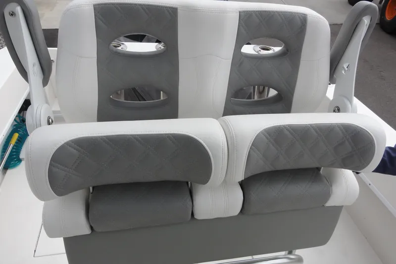 Slide: The Image of Luxury seating on 2012 Contender 25 Tournament boat, featuring gray and white upholstery. - 30