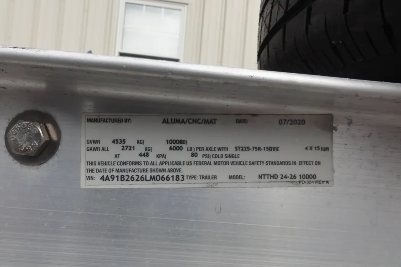 Slide: The Image of Label on trailer manufactured by ALUMA/CNC/MAT, dated 07/2020, with specifications and VIN details. - 36
