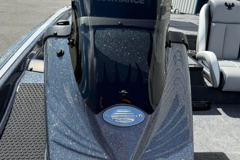 Slide: The Image of 2025 Phoenix 819 ZXL boat interior with glitter finish and comfortable seating. - 12