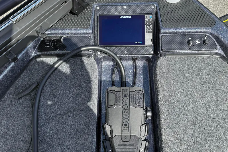 Slide: The Image of Lowrance HDS display and controls on 2025 Phoenix 819 ZXL boat dashboard. - 17