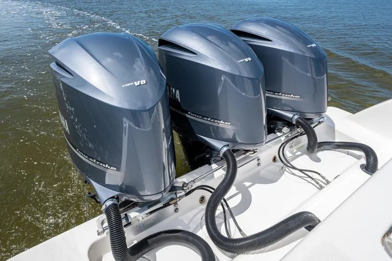 Slide: The Image of Triple Yamaha V8 engines on a 2015 Invincible 42 Open Fisherman boat. - 31