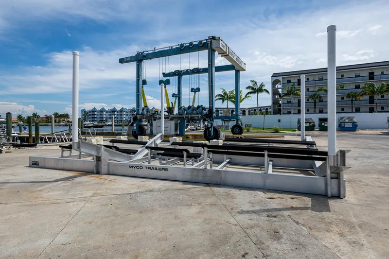 Slide: The Image of Boat lift and trailer at marina, clear sky, Invincible 42 Open Fisherman, 2015 model. - 34