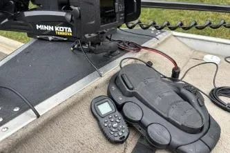 Slide: The Image of 2002 Tracker Pro Team 165 boat with Minn Kota Terrova trolling motor and remote control. - 10