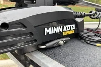 Slide: The Image of Minn Kota Terrova motor on 2002 Tracker Pro Team 165 boat deck. - 2
