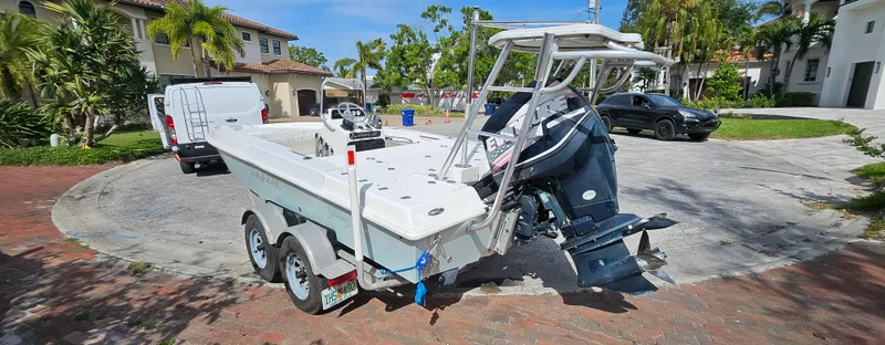 Slide: The Image of 2007 Young Boats 20 Bay on trailer in residential driveway. - 3