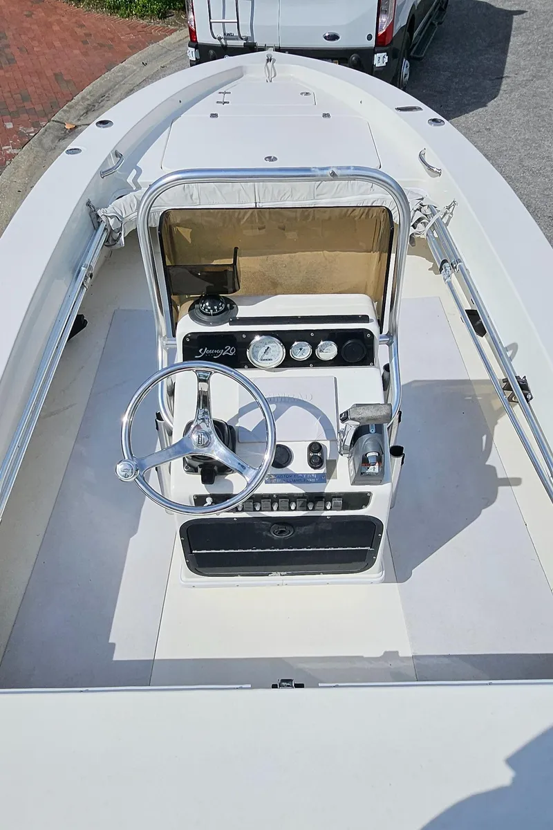 Slide: The Image of 2007 Young Boats 20 Bay, top view of steering console and controls. - 9
