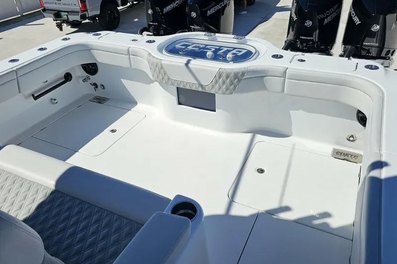 Slide: The Image of 2025 Costa Custom Boats 34ST interior with sleek white design and modern features. - 41