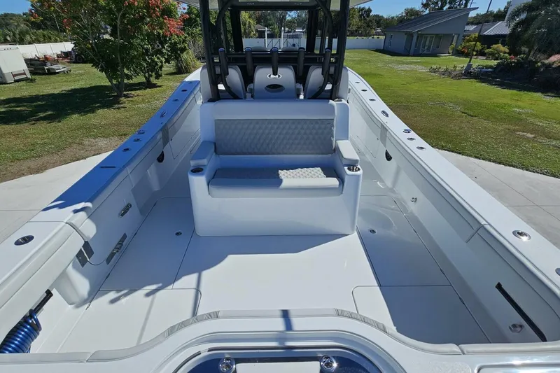 Slide: The Image of 2025 Costa Custom Boats 34ST interior, featuring spacious seating and sleek design. - 50