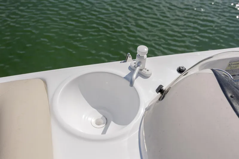 Slide: The Image of 2019 Hurricane SunDeck Sport 201 OB boat sink and faucet detail. - 22