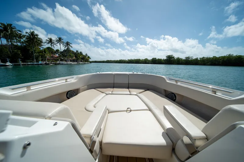 Slide: The Image of 2018 Boston Whaler 320 Vantage boat interior with scenic water view. - 42