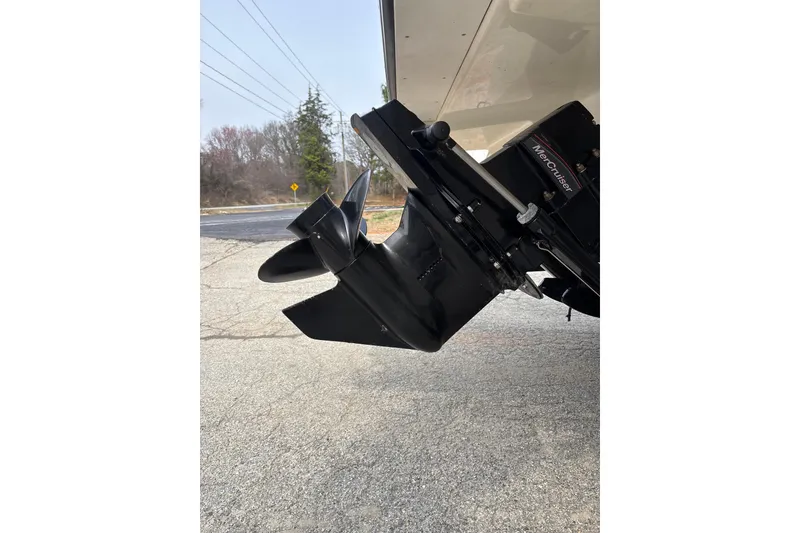 Slide: The Image of 2023 Sea Ray SPX 210 boat with MerCruiser engine, close-up of propeller and drive. - 28