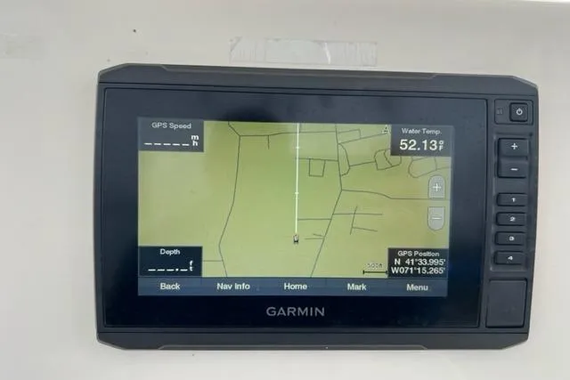 Slide: The Image of Garmin GPS display on 2021 Cobia 237 Center Console, showing navigation and water temperature. - 6