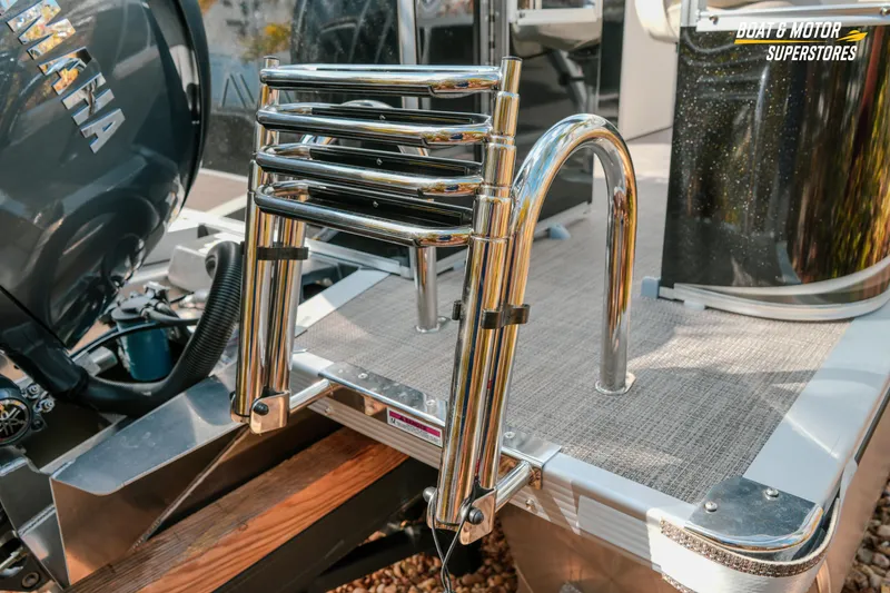 Slide: The Image of 2026 Avalon LSZ Rear Fish boat with Yamaha engine and stainless steel ladder. - 16