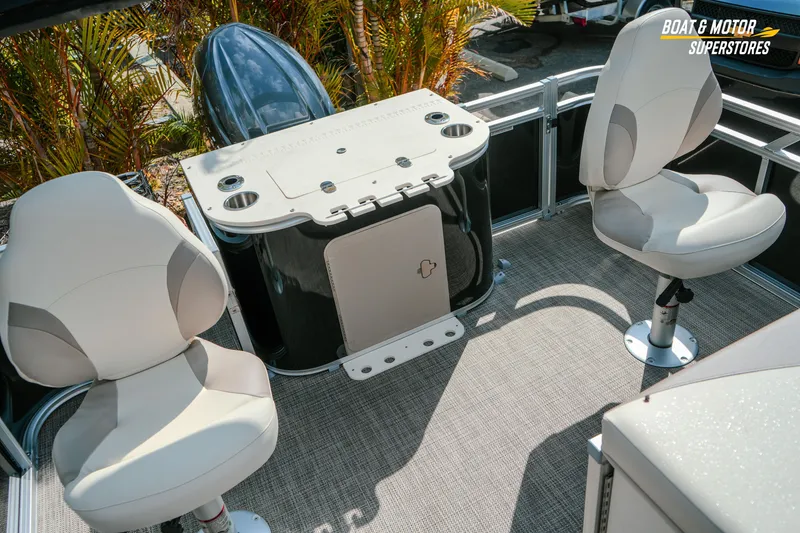 Slide: The Image of 2026 Avalon LSZ Rear Fish boat interior with swivel seats and fishing station. - 18