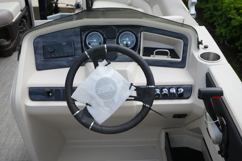 Slide: The Image of Steering console of 2026 Avalon LSZ Rear Fish boat, featuring modern controls and gauges. - 30