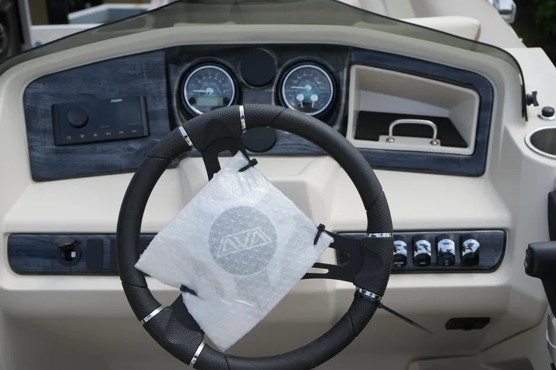 Slide: The Image of Steering wheel and dashboard of 2026 Avalon LSZ Rear Fish boat. - 31