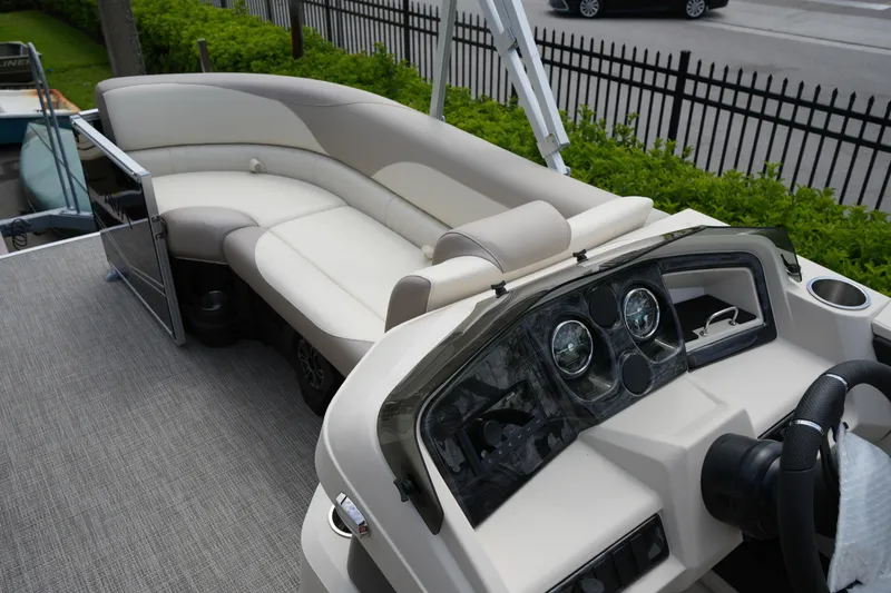 Slide: The Image of 2026 Avalon LSZ Rear Fish boat interior with plush seating and modern dashboard. - 34