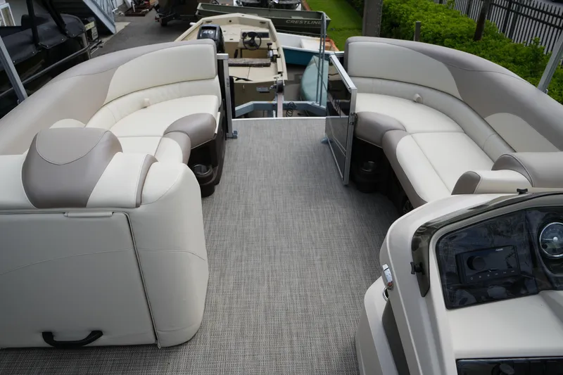 Slide: The Image of Luxurious 2026 Avalon LSZ Rear Fish pontoon boat interior with plush seating and modern design. - 35