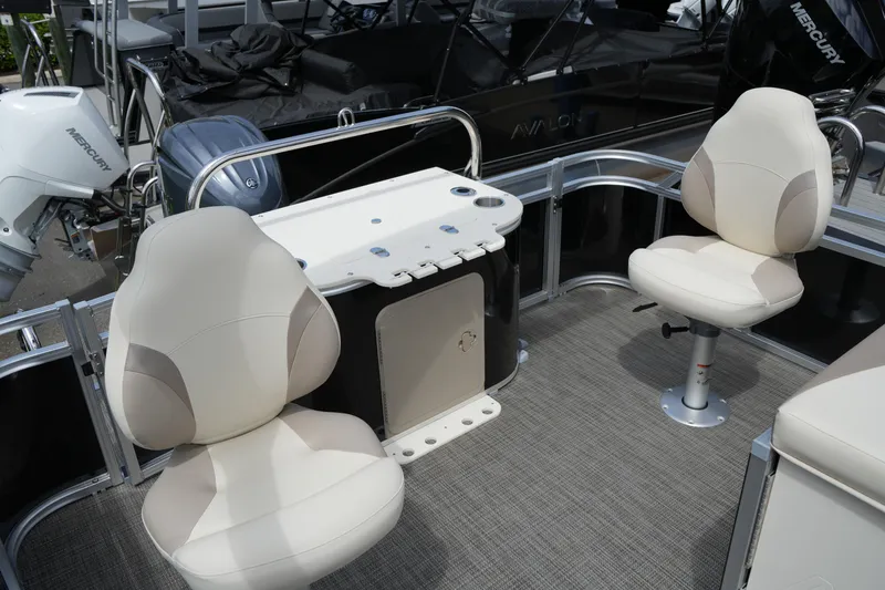 Slide: The Image of 2026 Avalon LSZ Rear Fish boat interior with swivel seats and fishing station. - 41