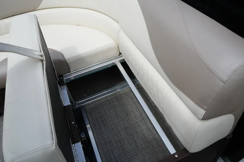 Slide: The Image of 2026 Avalon LSZ Rear Fish boat seat with storage compartment open. - 43