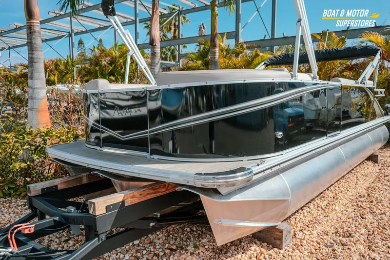 Slide: The Image of 2026 Avalon LSZ Rear Fish 23' pontoon boat on display at dealership. - 6