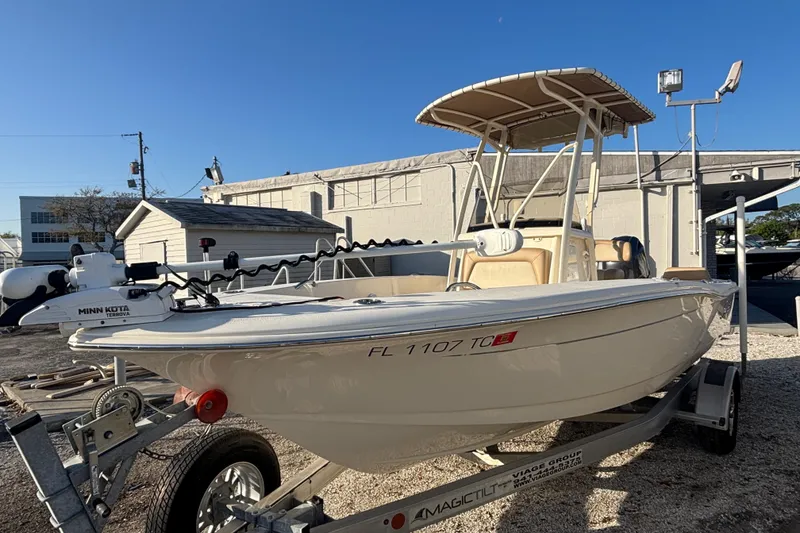 Slide: The Image of 2022 Scout 195 Sportfish boat on trailer, featuring Minn Kota Terrova motor. - 3