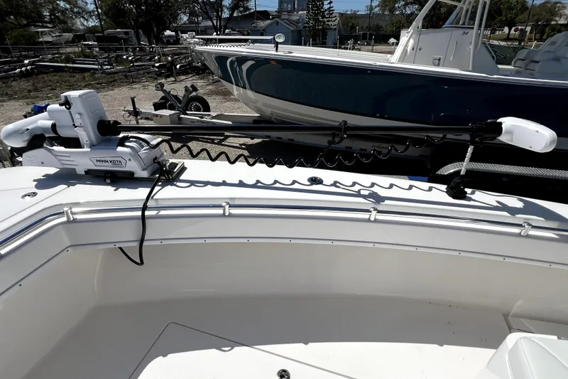 Slide: The Image of 2025 Contender 25 Tournament boat with Minn Kota trolling motor on deck. - 12